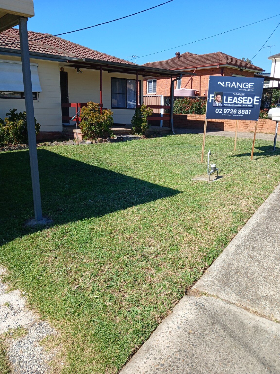 Neatly cut front lawn of a Sydney home with tidy edges
